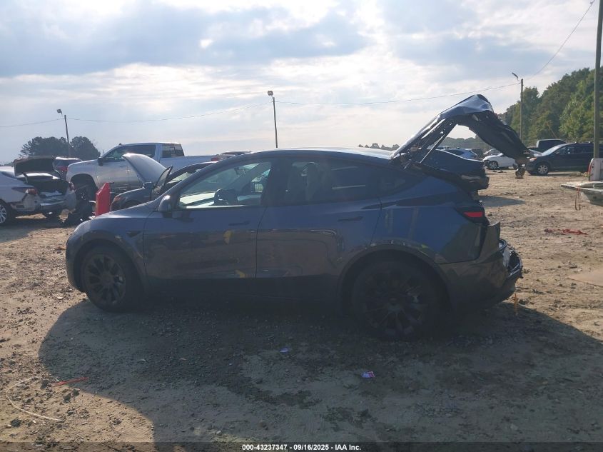 2023 Tesla Model Y Awd/Long Range Dual Motor All-Wheel Drive VIN: 7SAYGDEE4PA167984 Lot: 43237347