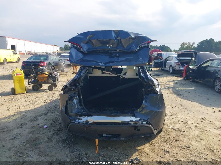 2023 Tesla Model Y Awd/Long Range Dual Motor All-Wheel Drive VIN: 7SAYGDEE4PA167984 Lot: 43237347