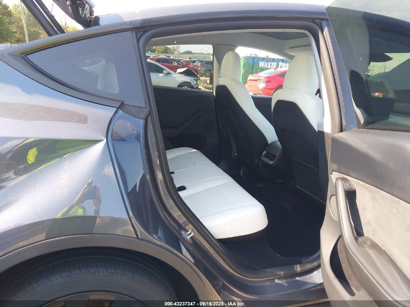 2023 Tesla Model Y Awd/Long Range Dual Motor All-Wheel Drive VIN: 7SAYGDEE4PA167984 Lot: 43237347