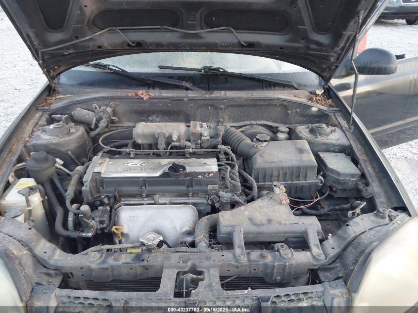 2004 Hyundai Accent VIN: KMHCF35C94U289597 Lot: 43237762