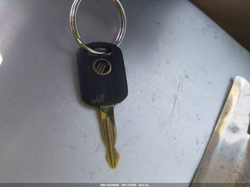 2003 Mercury Grand Marquis Gs VIN: 2MEFM74W03X635598 Lot: 43239450