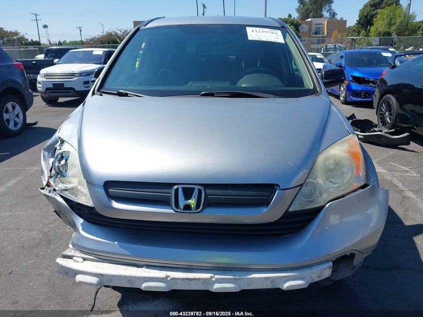 2007 Honda Cr-V Lx VIN: JHLRE38377C008200 Lot: 43239782