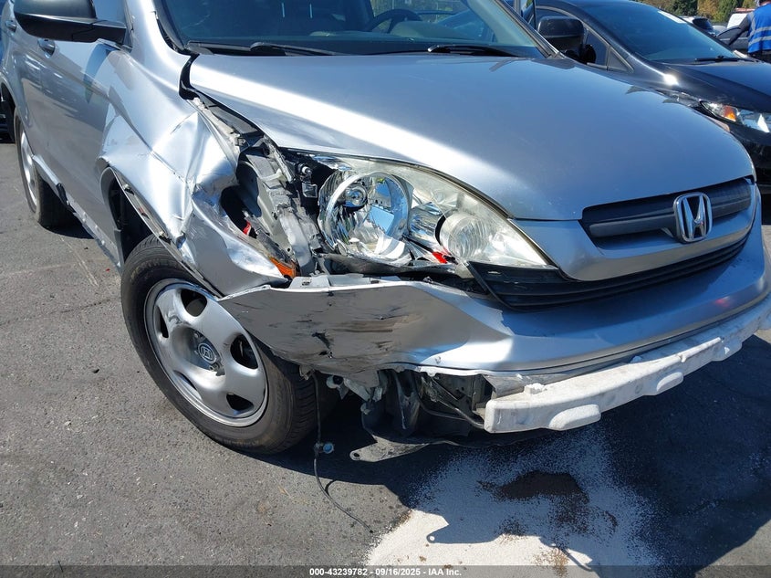 2007 Honda Cr-V Lx VIN: JHLRE38377C008200 Lot: 43239782