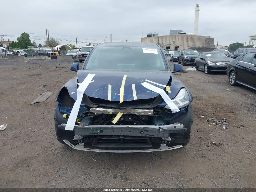 2023 Tesla Model Y Awd/Long Range Dual Motor All-Wheel Drive VIN: 7SAYGDEE1PA099062 Lot: 43242280