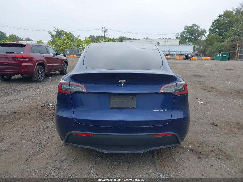 2023 Tesla Model Y Awd/Long Range Dual Motor All-Wheel Drive VIN: 7SAYGDEE1PA099062 Lot: 43242280