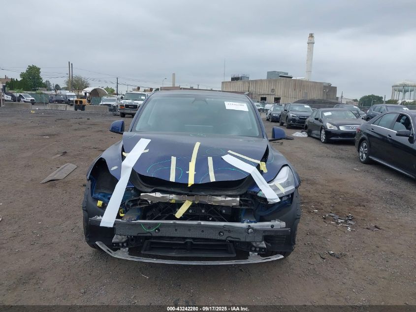 2023 Tesla Model Y Awd/Long Range Dual Motor All-Wheel Drive VIN: 7SAYGDEE1PA099062 Lot: 43242280