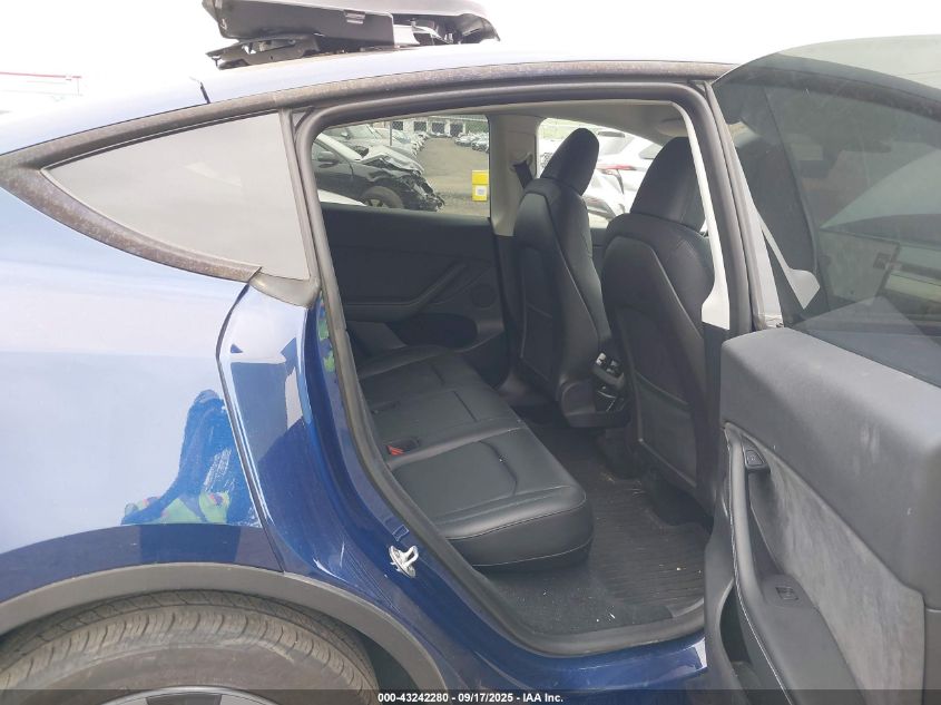 2023 Tesla Model Y Awd/Long Range Dual Motor All-Wheel Drive VIN: 7SAYGDEE1PA099062 Lot: 43242280