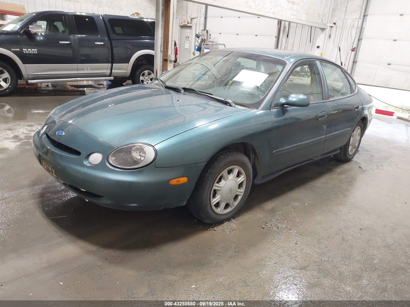 1997 Ford Taurus Gl green sedan gasoline 1FALP52U0VA110172 photo #3