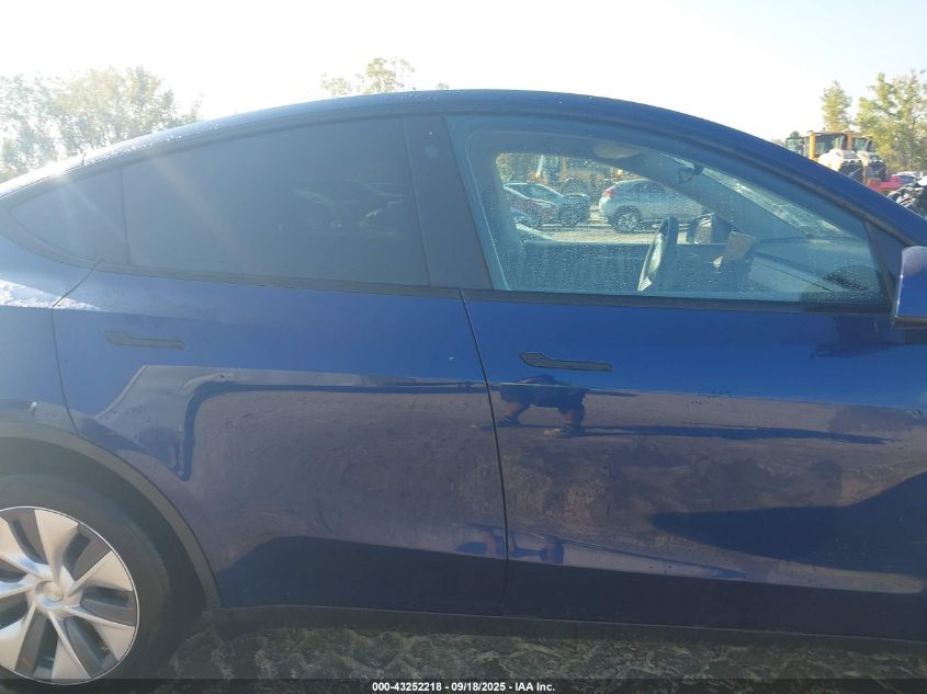 2023 Tesla Model Y Awd/Long Range Dual Motor All-Wheel Drive VIN: 7SAYGDEE4PA125024 Lot: 43252218