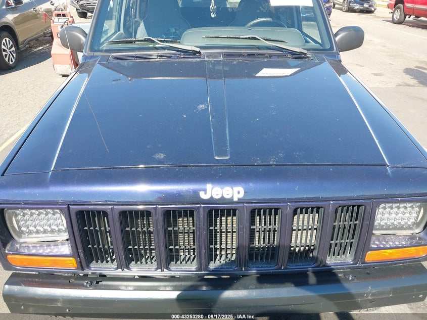 1999 Jeep Cherokee Classic/Sport VIN: 1J4FF68S0XL519084 Lot: 43253280