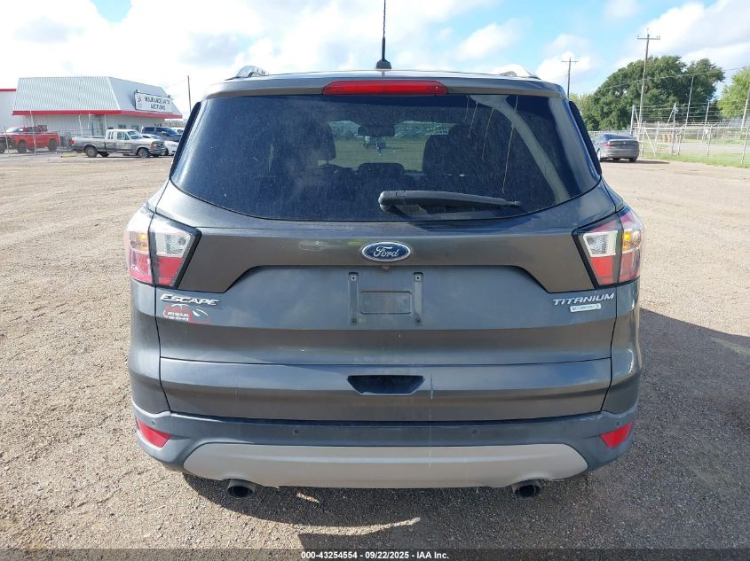 2017 Ford Escape Titanium VIN: 1FMCU0J97HUE15475 Lot: 43254554
