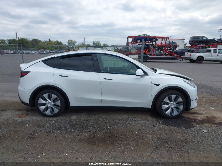 2023 Tesla Model Y Awd/Long Range Dual Motor All-Wheel Drive VIN: 7SAYGAEE5PF917779 Lot: 43259715