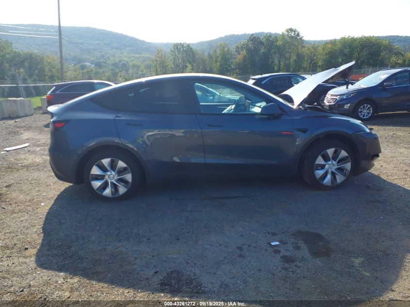 2023 Tesla Model Y Awd/Long Range Dual Motor All-Wheel Drive VIN: 7SAYGDEE1PA119472 Lot: 43261272