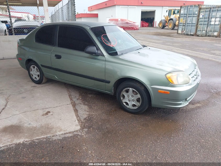 KMHCF35C13U261081 2003 Hyundai Accent auction photo 1
