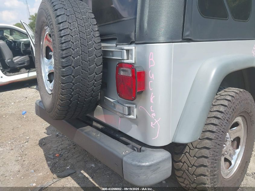 2002 Jeep Wrangler X VIN: 1J4FA39S02P748202 Lot: 43266082