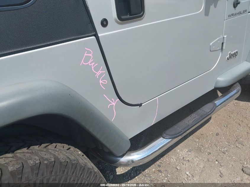 2002 Jeep Wrangler X VIN: 1J4FA39S02P748202 Lot: 43266082