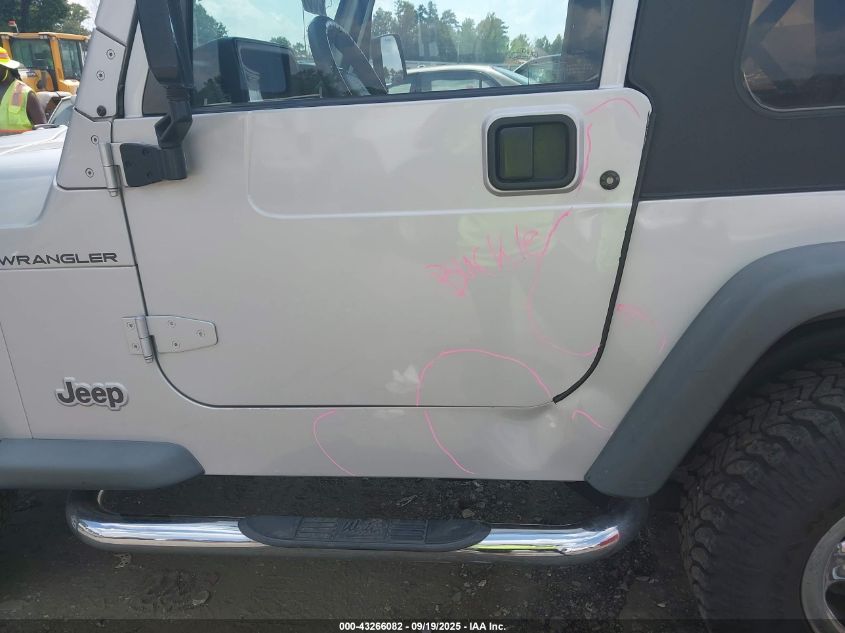 2002 Jeep Wrangler X VIN: 1J4FA39S02P748202 Lot: 43266082