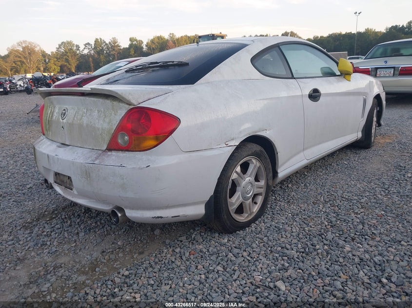 KMHHN65F63U061107 2003 HYUNDAI TIBURON photo no. 4