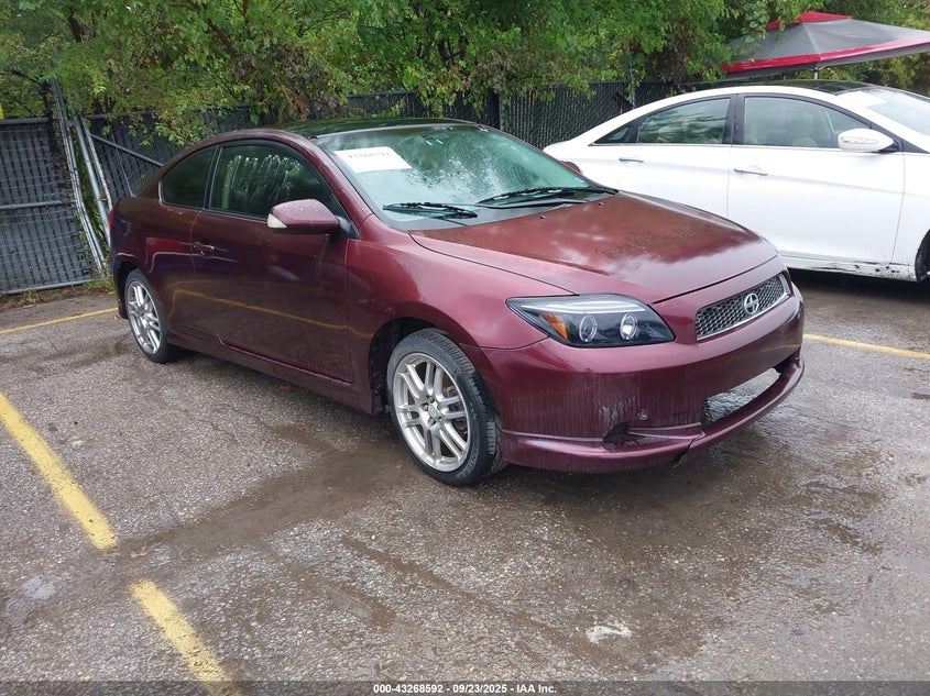 2005 Scion Tc brown coupe gasoline JTKDE177550055295 photo #1