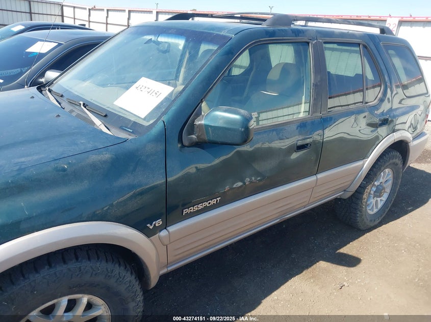 2001 Honda Passport Ex/Lx VIN: 4S6DM58WX14406005 Lot: 43274151