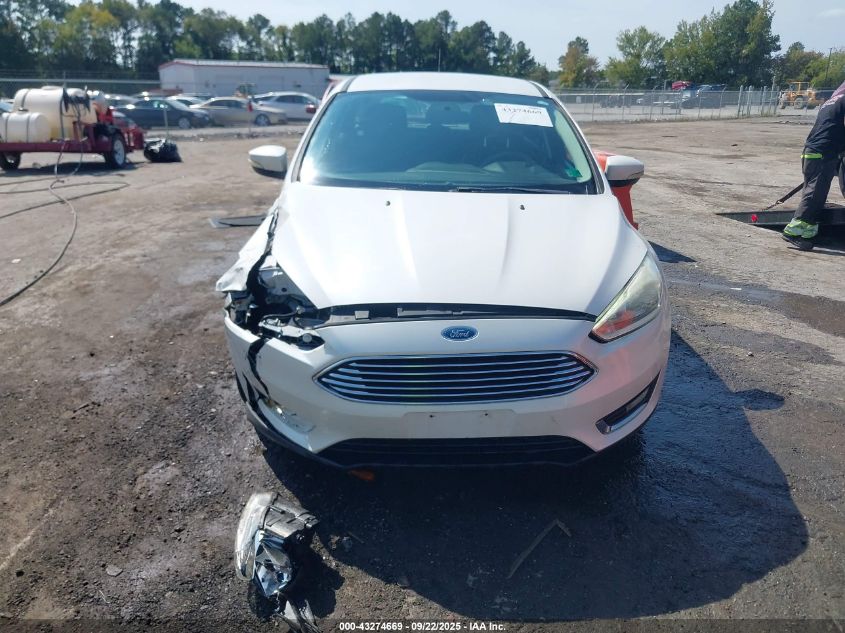 2015 Ford Focus Titanium VIN: 1FADP3N29FL366447 Lot: 43274669