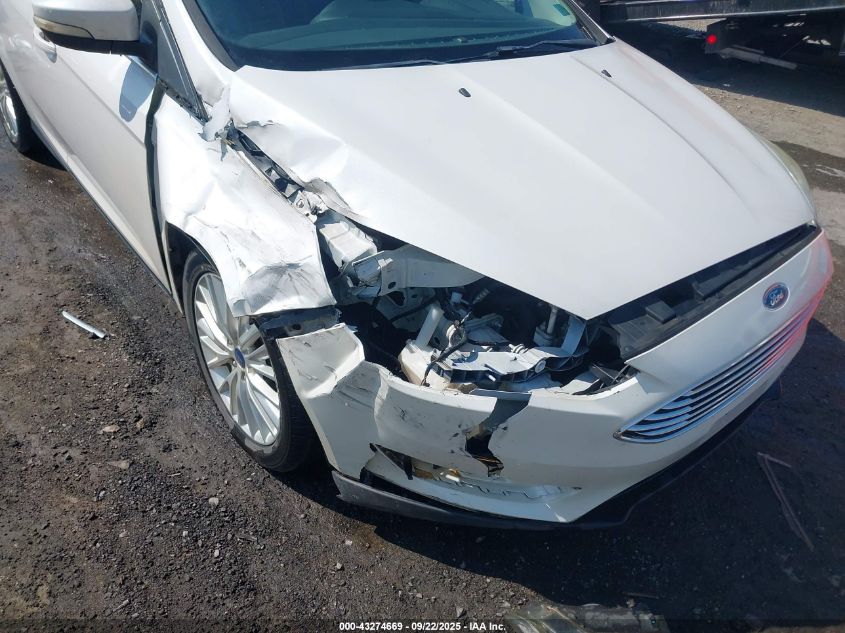 2015 Ford Focus Titanium VIN: 1FADP3N29FL366447 Lot: 43274669
