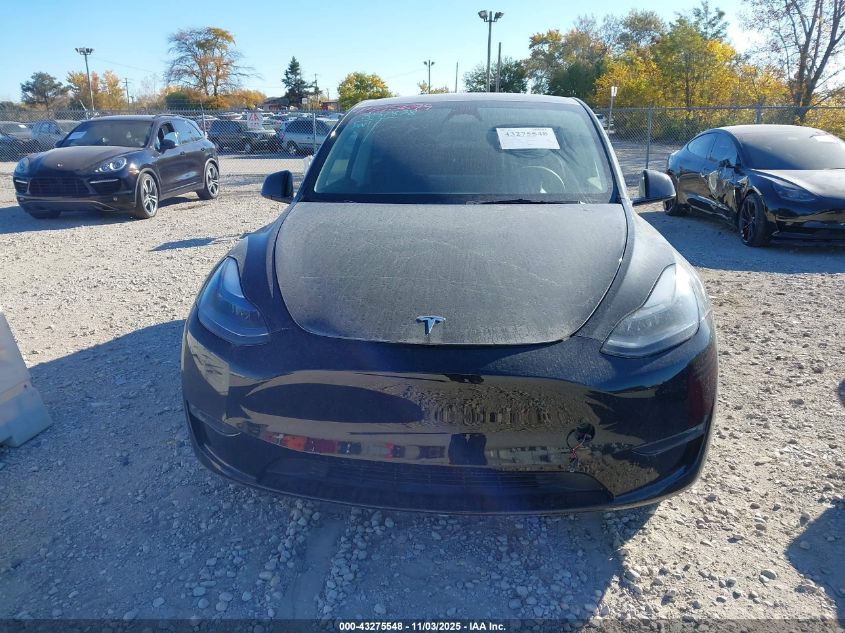 2023 Tesla Model Y Awd/Long Range Dual Motor All-Wheel Drive VIN: 7SAYGDEE2PF851838 Lot: 43275548