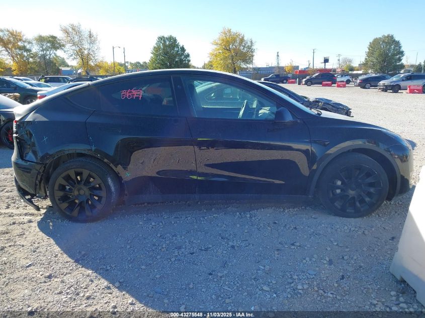 2023 Tesla Model Y Awd/Long Range Dual Motor All-Wheel Drive VIN: 7SAYGDEE2PF851838 Lot: 43275548