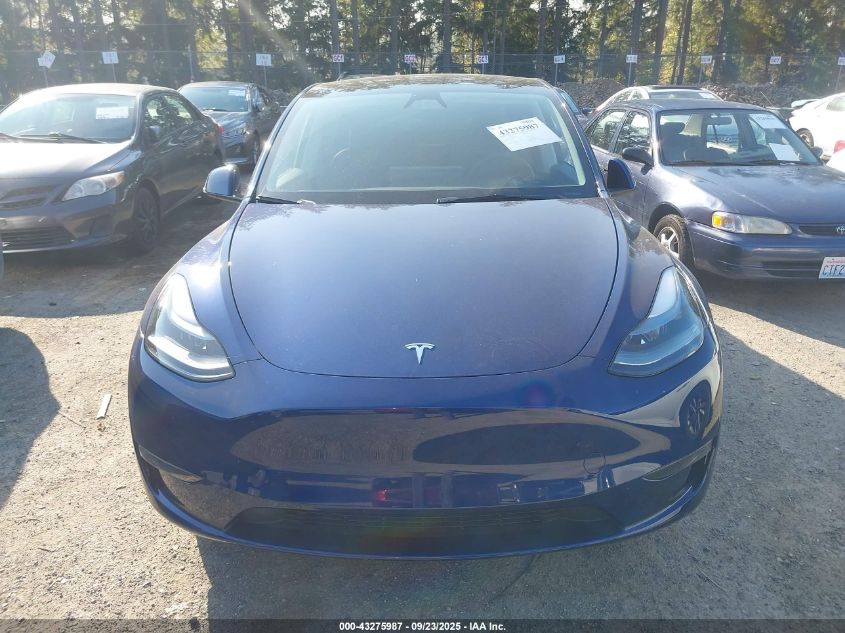 2023 Tesla Model Y Awd/Long Range Dual Motor All-Wheel Drive VIN: 7SAYGDEE3PF957974 Lot: 43275987
