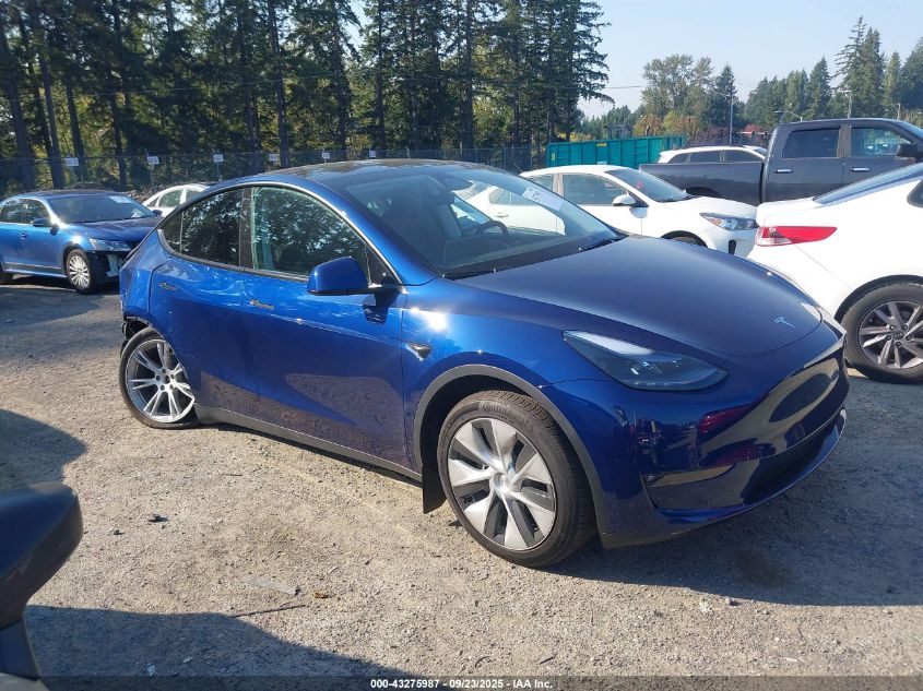 2023 Tesla Model Y Awd/Long Range Dual Motor All-Wheel Drive VIN: 7SAYGDEE3PF957974 Lot: 43275987