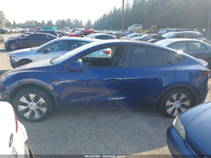 2023 Tesla Model Y Awd/Long Range Dual Motor All-Wheel Drive VIN: 7SAYGDEE3PF957974 Lot: 43275987