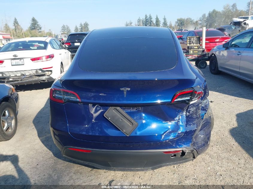 2023 Tesla Model Y Awd/Long Range Dual Motor All-Wheel Drive VIN: 7SAYGDEE3PF957974 Lot: 43275987