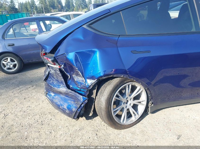 2023 Tesla Model Y Awd/Long Range Dual Motor All-Wheel Drive VIN: 7SAYGDEE3PF957974 Lot: 43275987