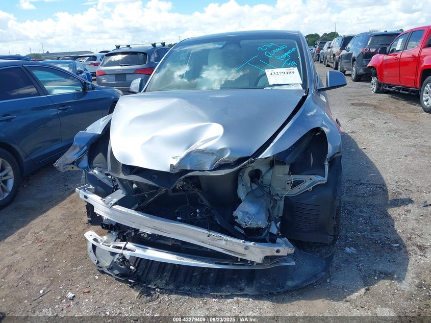 2024 Tesla Model Y Long Range Dual Motor All-Wheel Drive/Rwd VIN: 7SAYGDED1RA327121 Lot: 43279409