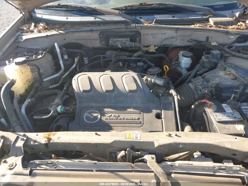 2001 Mazda Tribute Dx V6 VIN: 4F2YU06141KM46567 Lot: 43279639