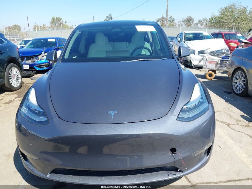 2023 Tesla Model Y Awd/Long Range Dual Motor All-Wheel Drive VIN: 7SAYGDEE7PA154808 Lot: 43280549