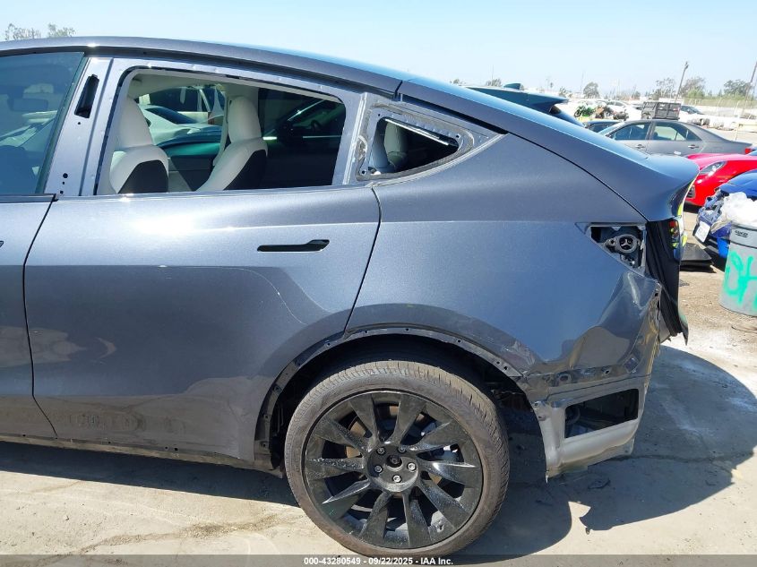 2023 Tesla Model Y Awd/Long Range Dual Motor All-Wheel Drive VIN: 7SAYGDEE7PA154808 Lot: 43280549