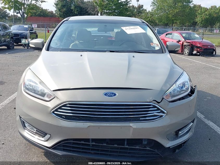 2016 Ford Focus Titanium VIN: 1FADP3N22GL205374 Lot: 43280685
