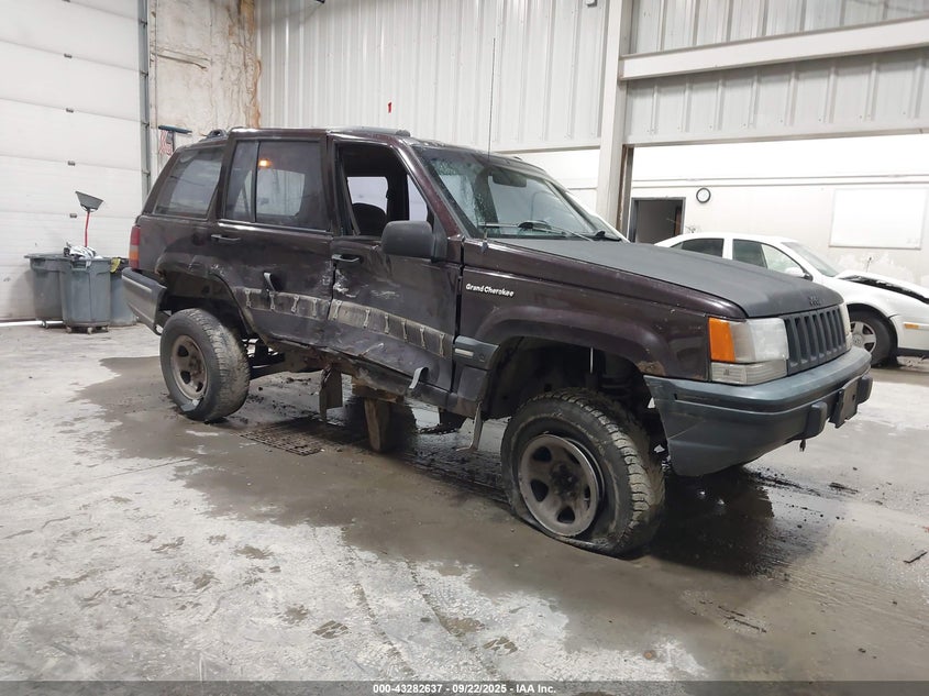 1993 Jeep Grand Cherokee purple suv gasoline 1J4GZ68S6PC579995 photo #1