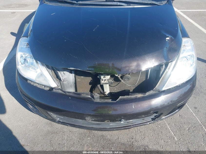 2012 Nissan Versa 1.8 S VIN: 3N1BC1CPXCK213004 Lot: 43283406