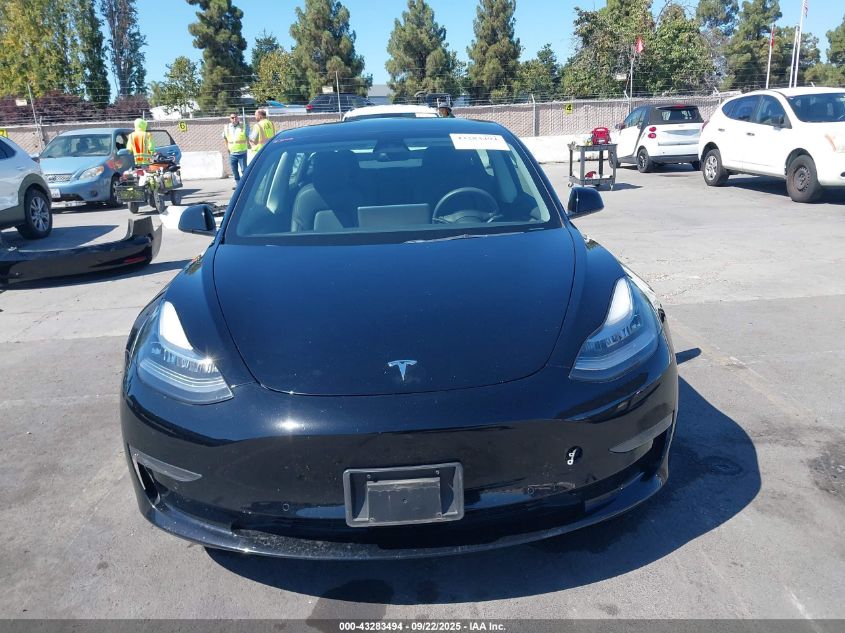 2022 Tesla Model 3 Long Range Dual Motor All-Wheel Drive VIN: 5YJ3E1EB9NF297289 Lot: 43283494