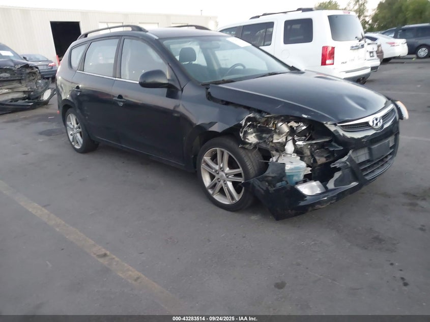 2010 Hyundai Elantra Touring Se black hatchback gasoline KMHDC8AE7AU063507 photo #1