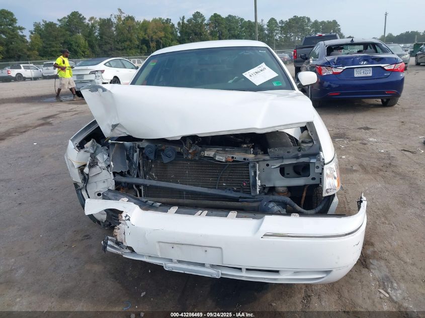 2003 Mercury Grand Marquis Gs VIN: 2MEFM74W33X669048 Lot: 43286469
