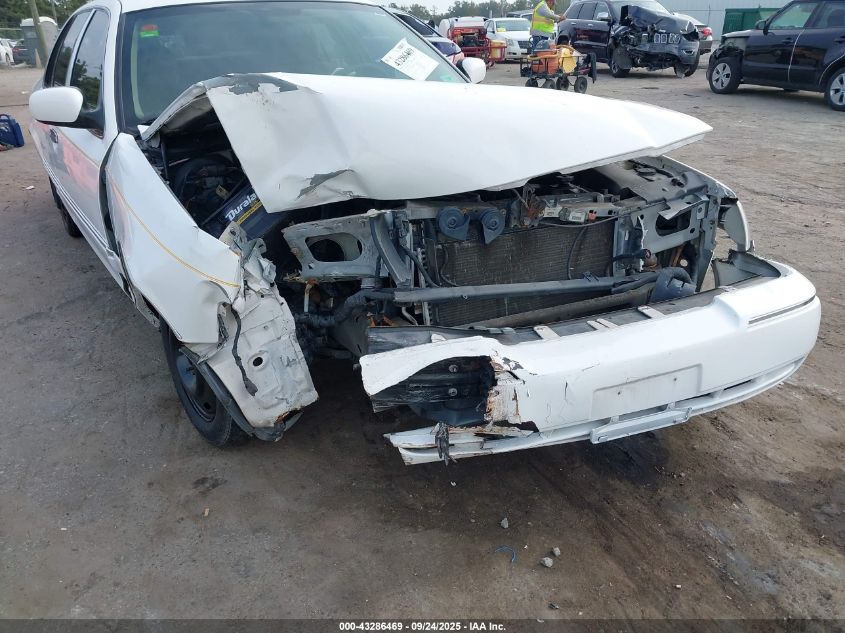 2003 Mercury Grand Marquis Gs VIN: 2MEFM74W33X669048 Lot: 43286469