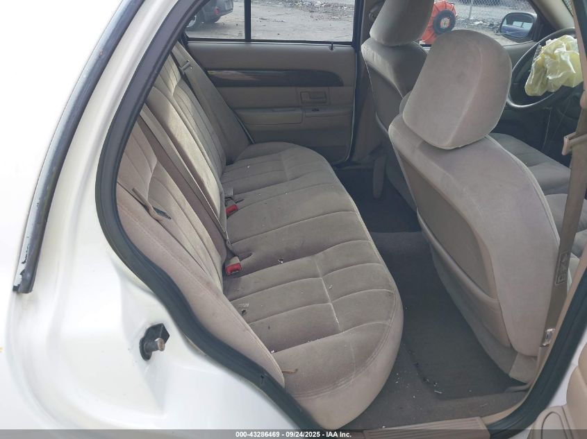 2003 Mercury Grand Marquis Gs VIN: 2MEFM74W33X669048 Lot: 43286469