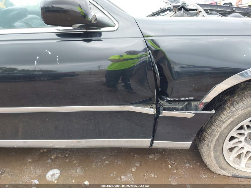 2000 Lincoln Town Car Signature VIN: 1LNHM82W1YY936080 Lot: 43287202