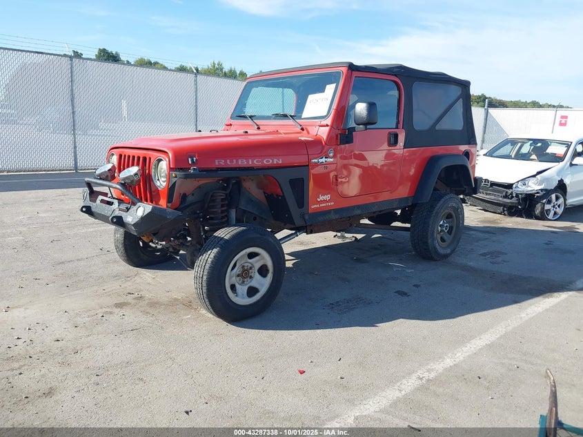 2006 Jeep Wrangler Unlimited Rubicon orange suv gasoline 1J4FA64S86P778174 photo #3