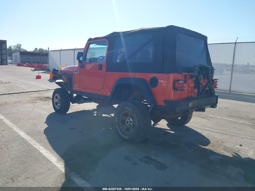 2006 Jeep Wrangler Unlimited Rubicon orange suv gasoline 1J4FA64S86P778174 photo #4