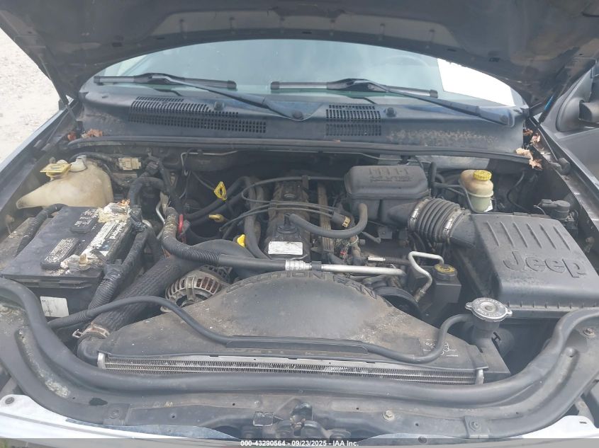 2003 Jeep Grand Cherokee Laredo VIN: 1J4GW48SX3C559109 Lot: 43290564