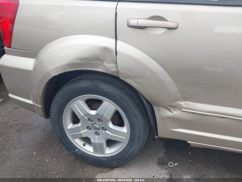 2009 Dodge Caliber Sxt VIN: 1B3HB48A59D233462 Lot: 43291024